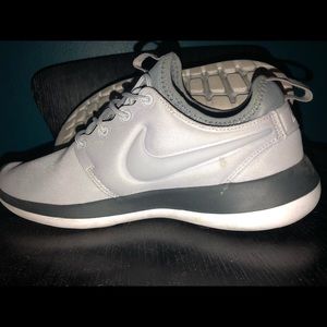 Grey and black Nike Roshes one